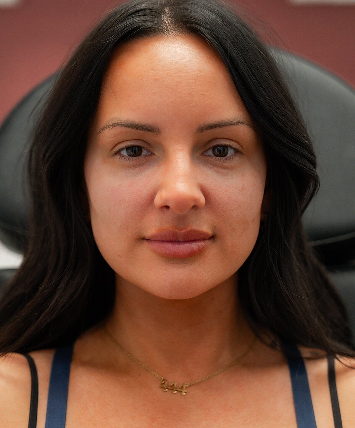 Client enjoying a beauty treatment at salon.