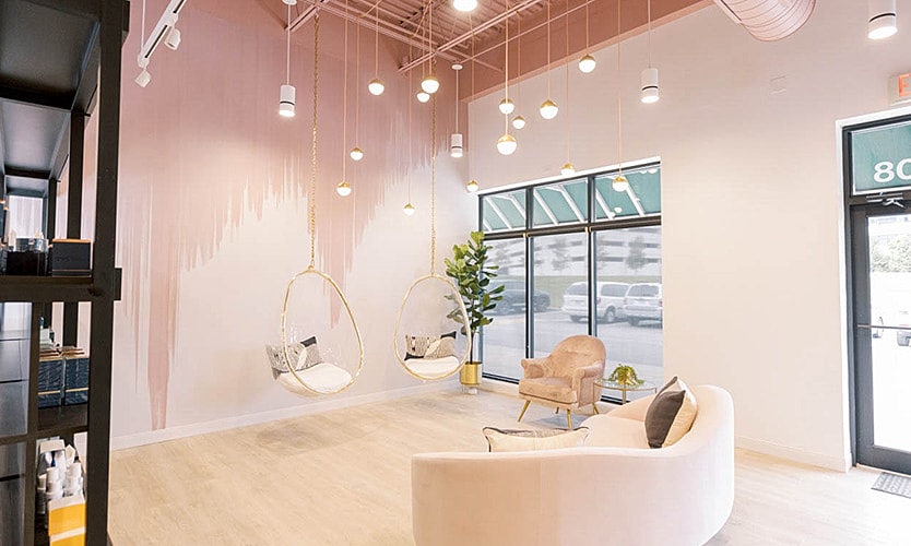 Modern waiting area with stylish seating and decor.