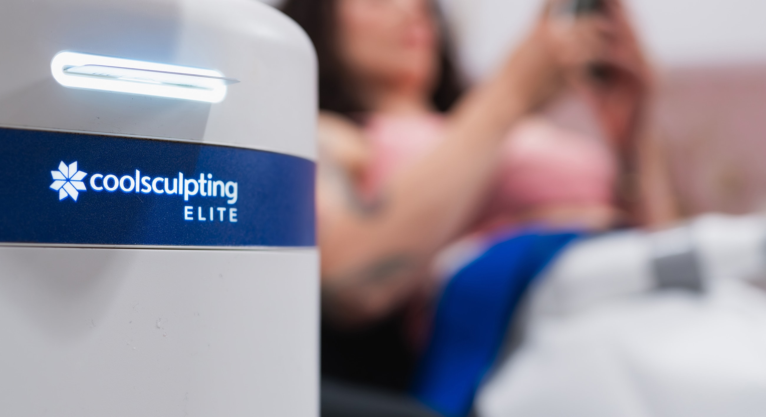 Woman stretching in white athletic wear.